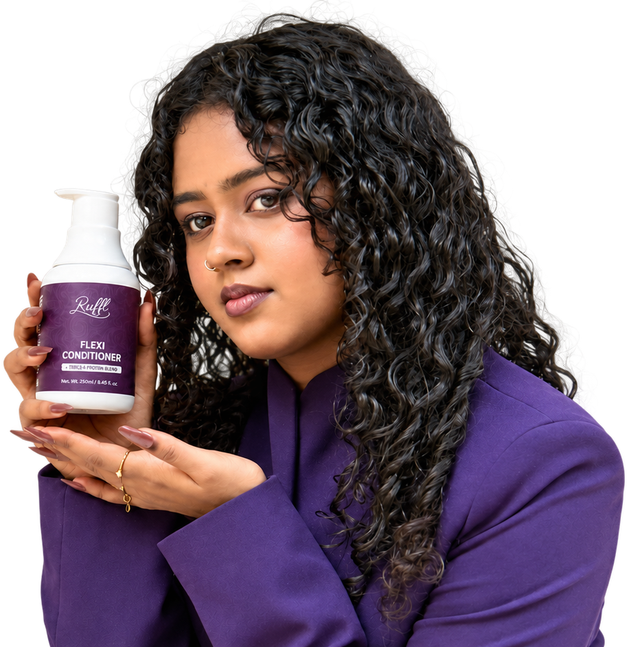 Woman with natural curls presenting RUFFL Flexi Conditioner